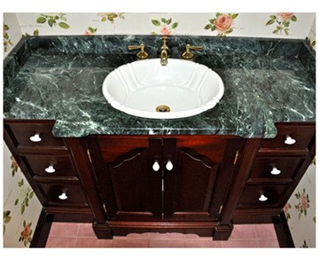 more than a sink - a custom cabinet with granite top<br/>